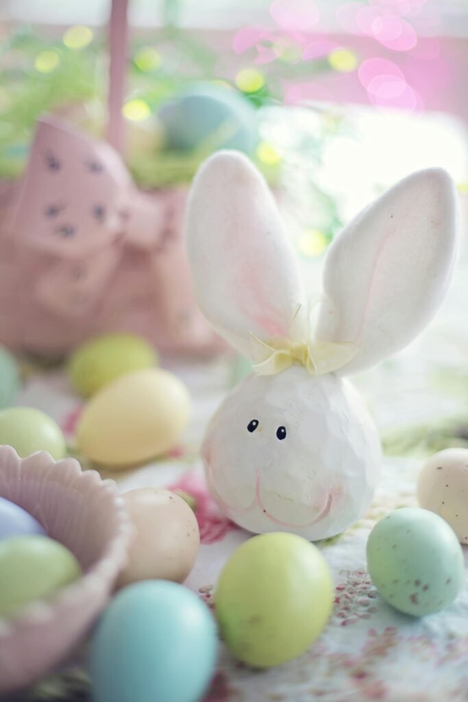 Cute Easter bunny and pastel eggs for festive spring decor.